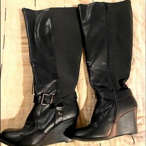 Like new Torrid knee high wide calf boots. Size 8